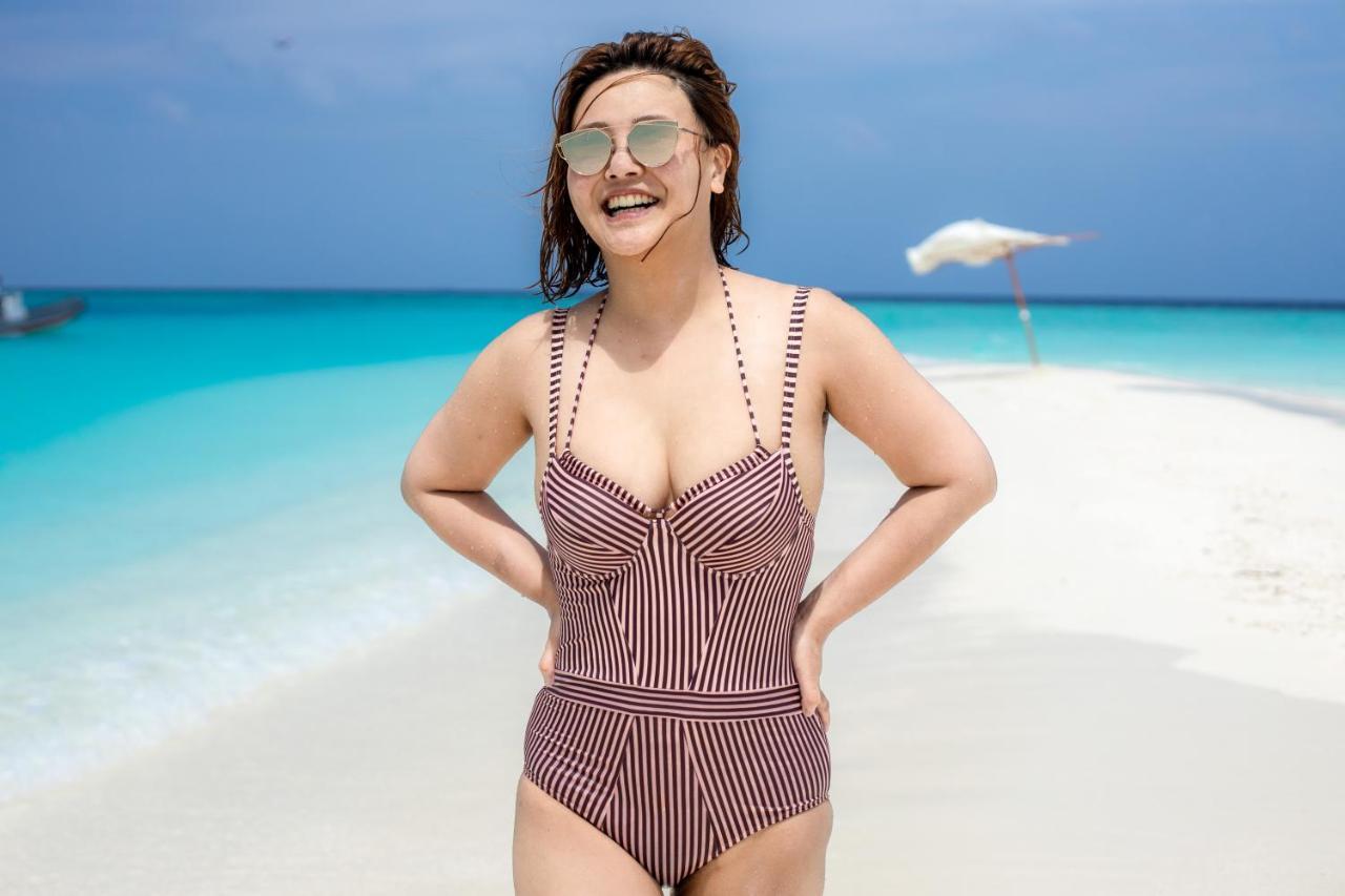 Perla Dhangethi Luaran gambar
