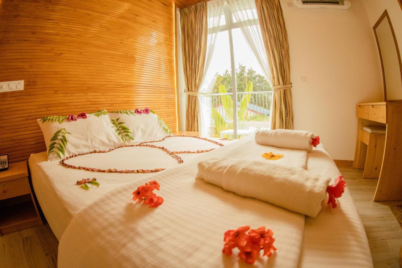 Perla Dhangethi Luaran gambar